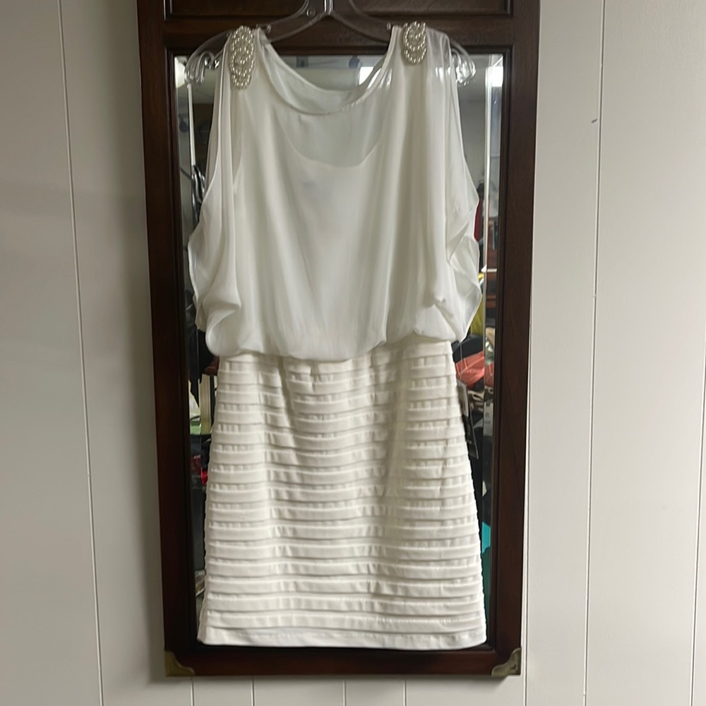 Woman’s dress size 8